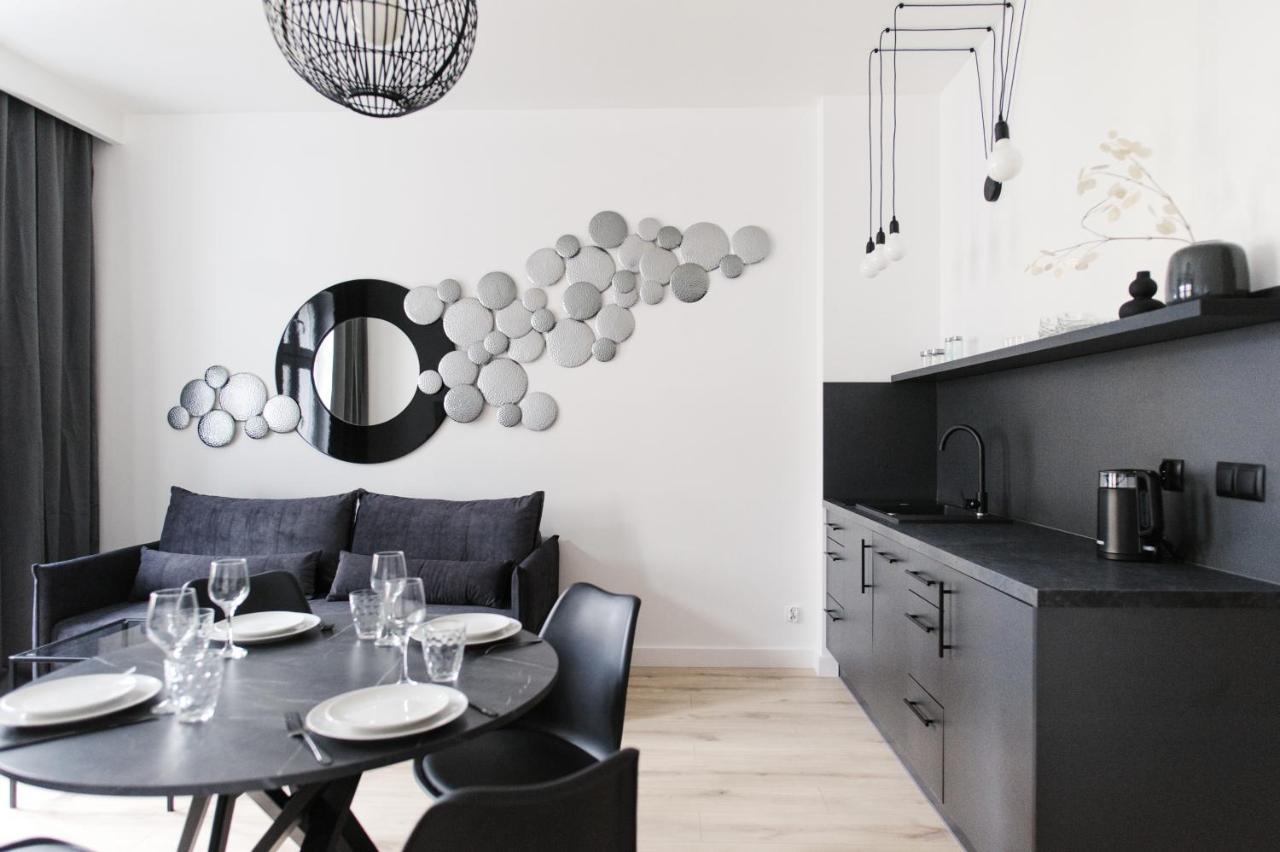 Manpro Apartments Torun Bagian luar foto